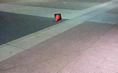 forlorn lonely tipped-over cone